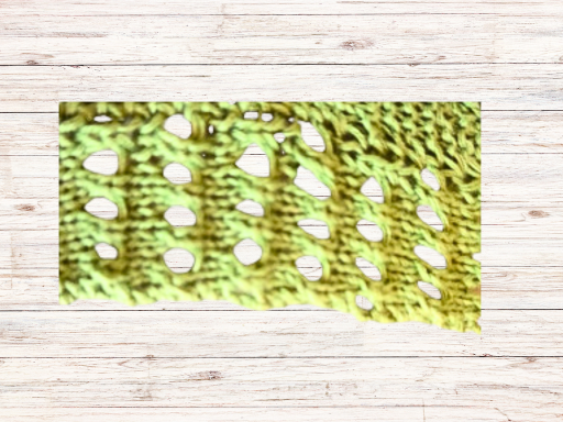 Blog-Inhaltsbild für 'Kostenlose Strickanleitung für eine 10-Stitch-Decke mit Lochmuster'