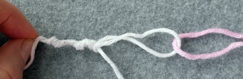 Blog-Inhaltsbild für 'Der perfekte Winterschal - Kostenlose Strickanleitung'