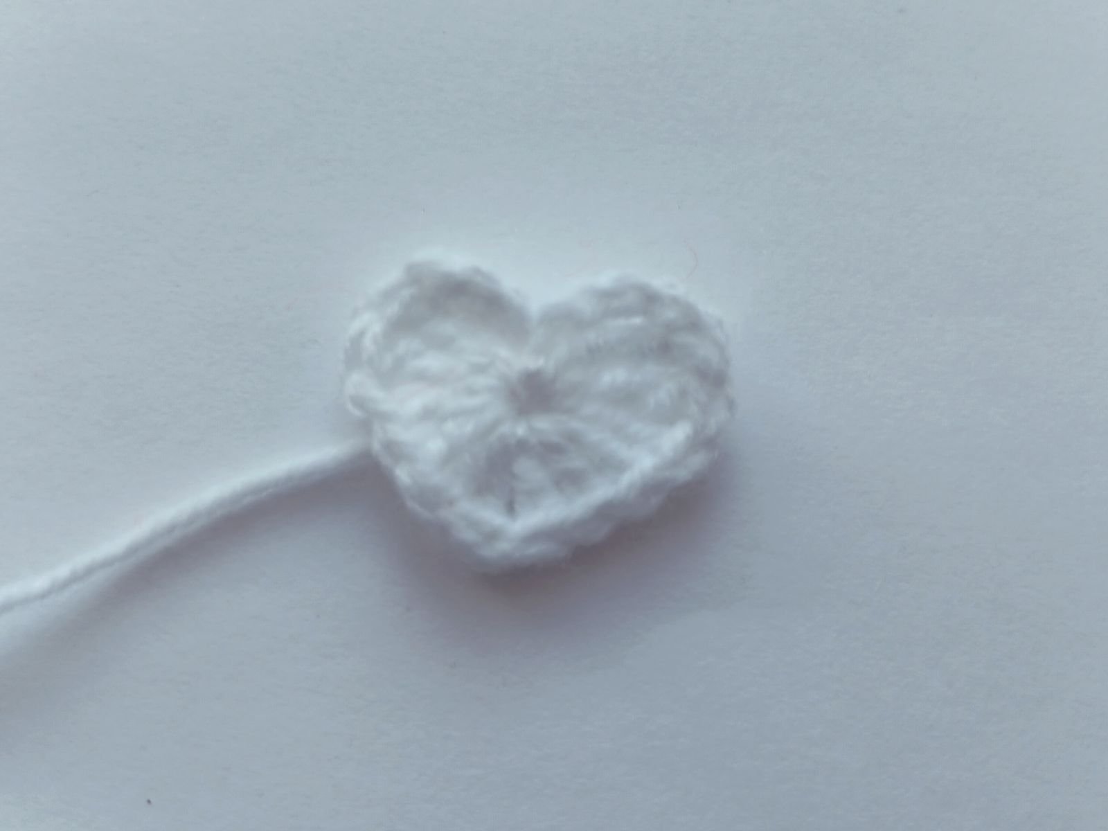 Blog-Inhaltsbild für 'Kostenlose Strickanleitung für Puppenmütze und Schal'