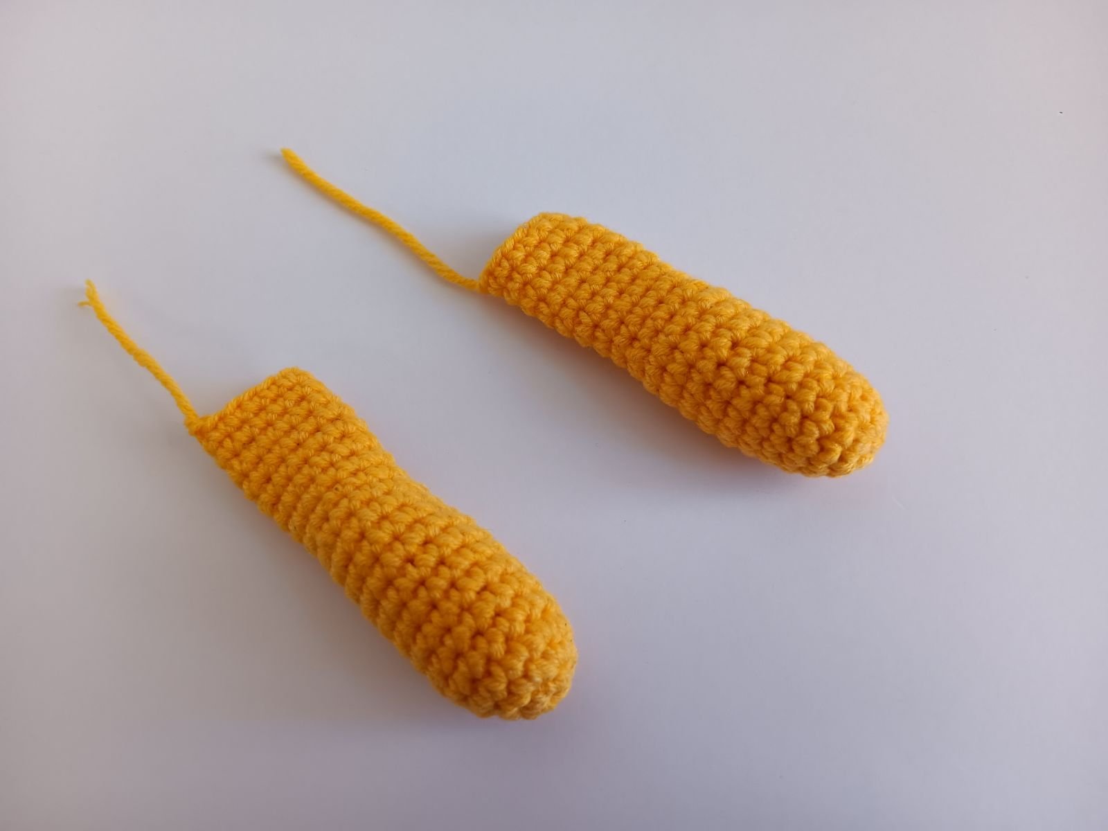 Blog-Inhaltsbild für 'Frosch mit Beuteltasche häkeln. Kostenlose Häkelanleitung'