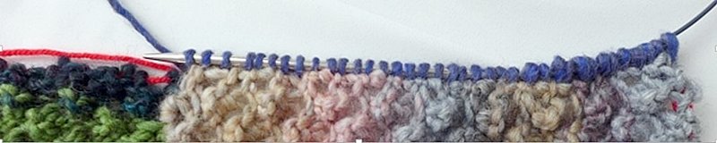 Blog-Inhaltsbild für 'Dornröschen-Patchwork-Decke aus Wollresten - Kostenlose Strickanleitung'