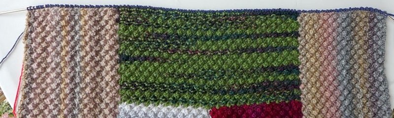 Blog-Inhaltsbild für 'Dornröschen-Patchwork-Decke aus Wollresten - Kostenlose Strickanleitung'