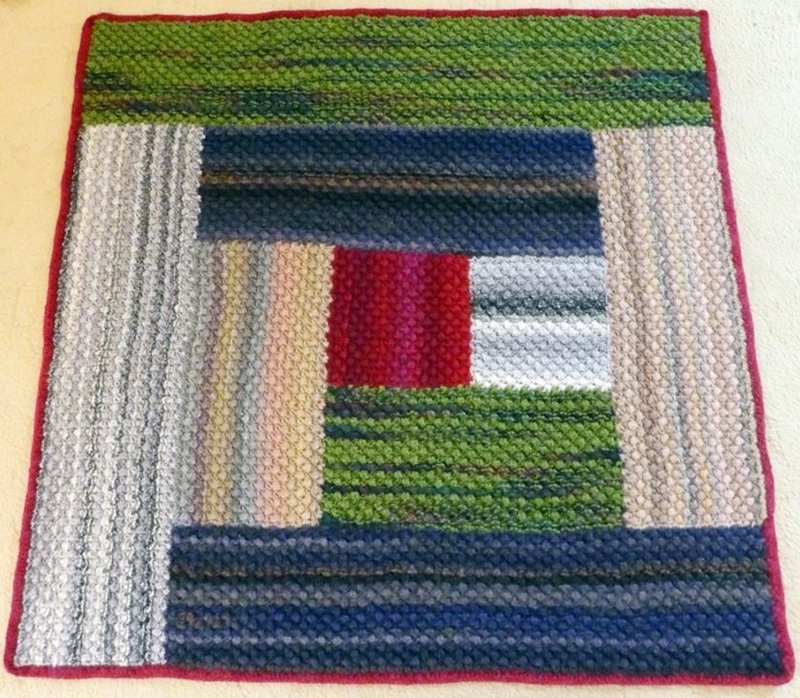 Blog-Inhaltsbild für 'Dornröschen-Patchwork-Decke aus Wollresten - Kostenlose Strickanleitung'