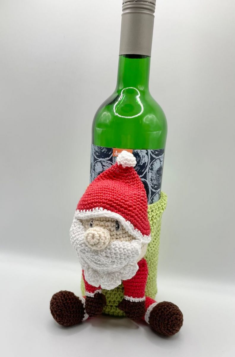 Blog-Inhaltsbild für 'Weihnachtliche Geschenkhülle, einfache Anleitung für eine Amigurumi Flaschenhülle'