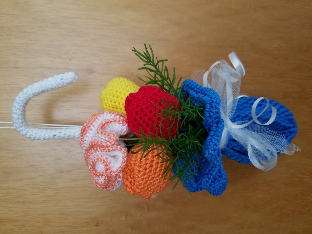 Crochet decoration tulips in umbrella
