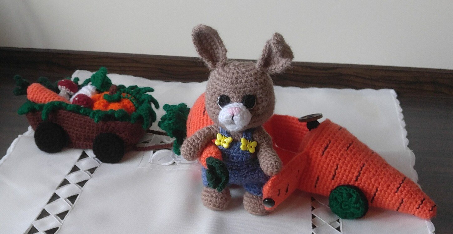 Easter bunny with a personal carrot car