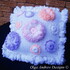 Cushion with a ruffled border and flower appliques knit/crochet pattern 048