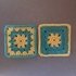 Two granny square patterns with flower