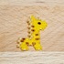 Kleine Giraffe / Charm / Anhänger / Ohrring