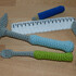 Crochet pattern for toddler's tools: hammer, screwdriver, wrench, ruler, pencil