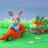 Easter bunny with a personal carrot car