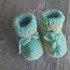 Strickanleitung Babyschuhe mit einem kleinen Zopf in der Mitte!