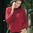 Roter Pulli mit Aranmuster