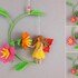 Flower fairy- hanging decoration made from scraps of yarn